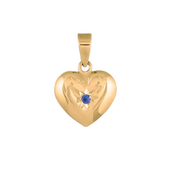 Hjerteformet vedhæng i guld med en blå syntetisk safir i midten.
